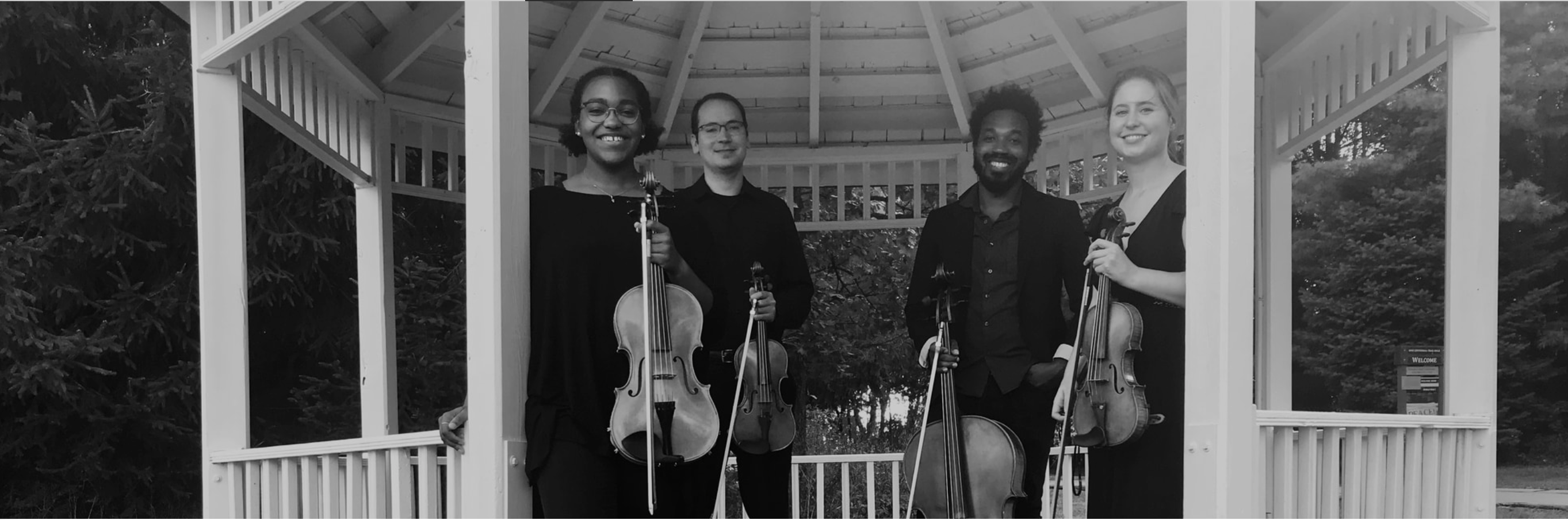Quartet members in a gazebo