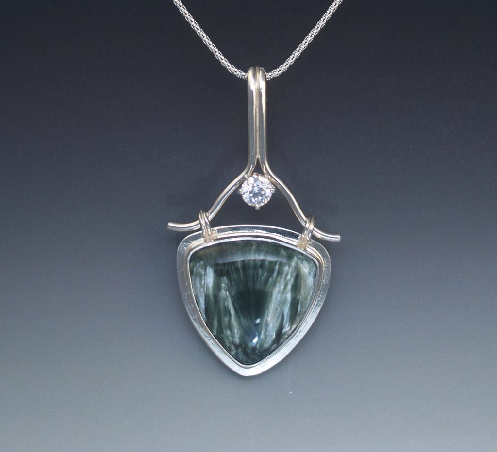 Silver pendant with seraphinite cabochon & cubic zirconia